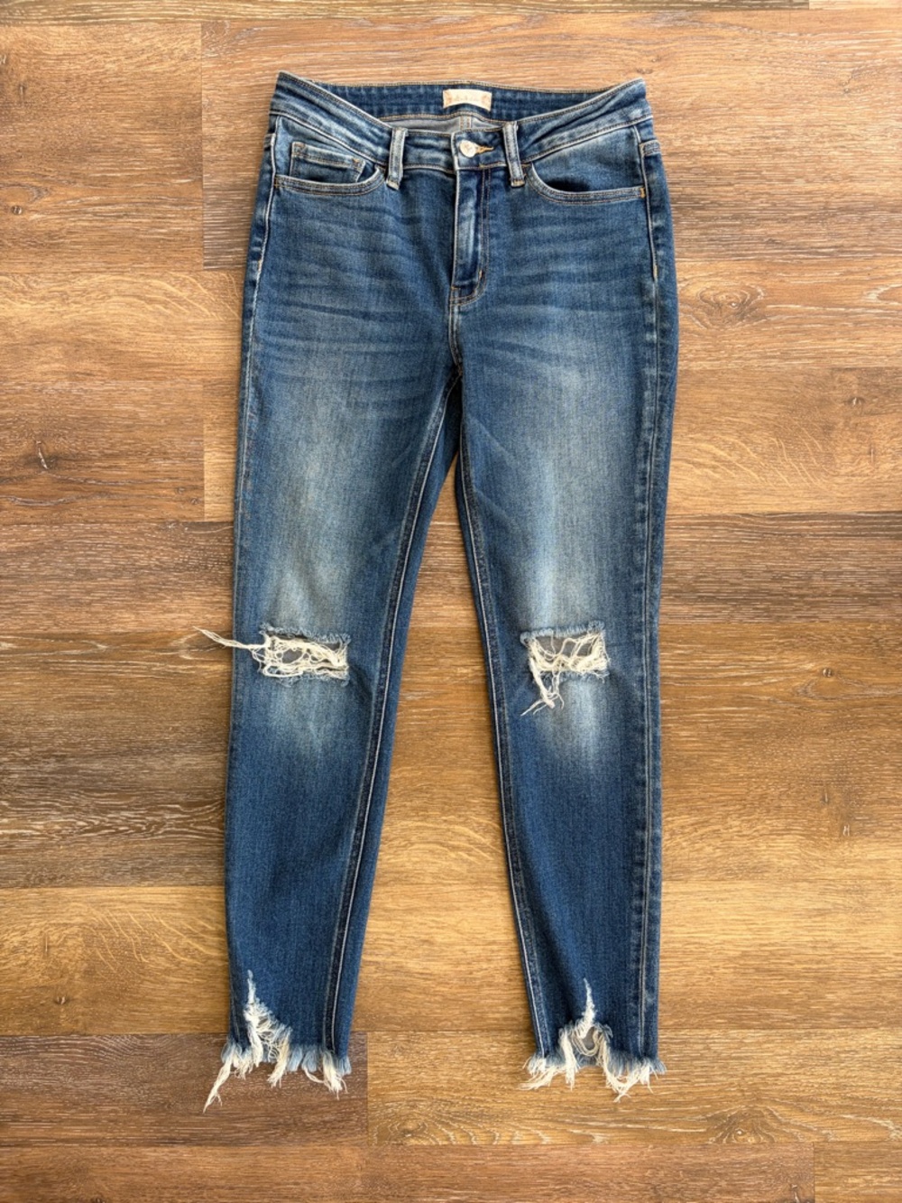Altar’d State vervet blue distressed jeans raw hem size 28. Length 36”
